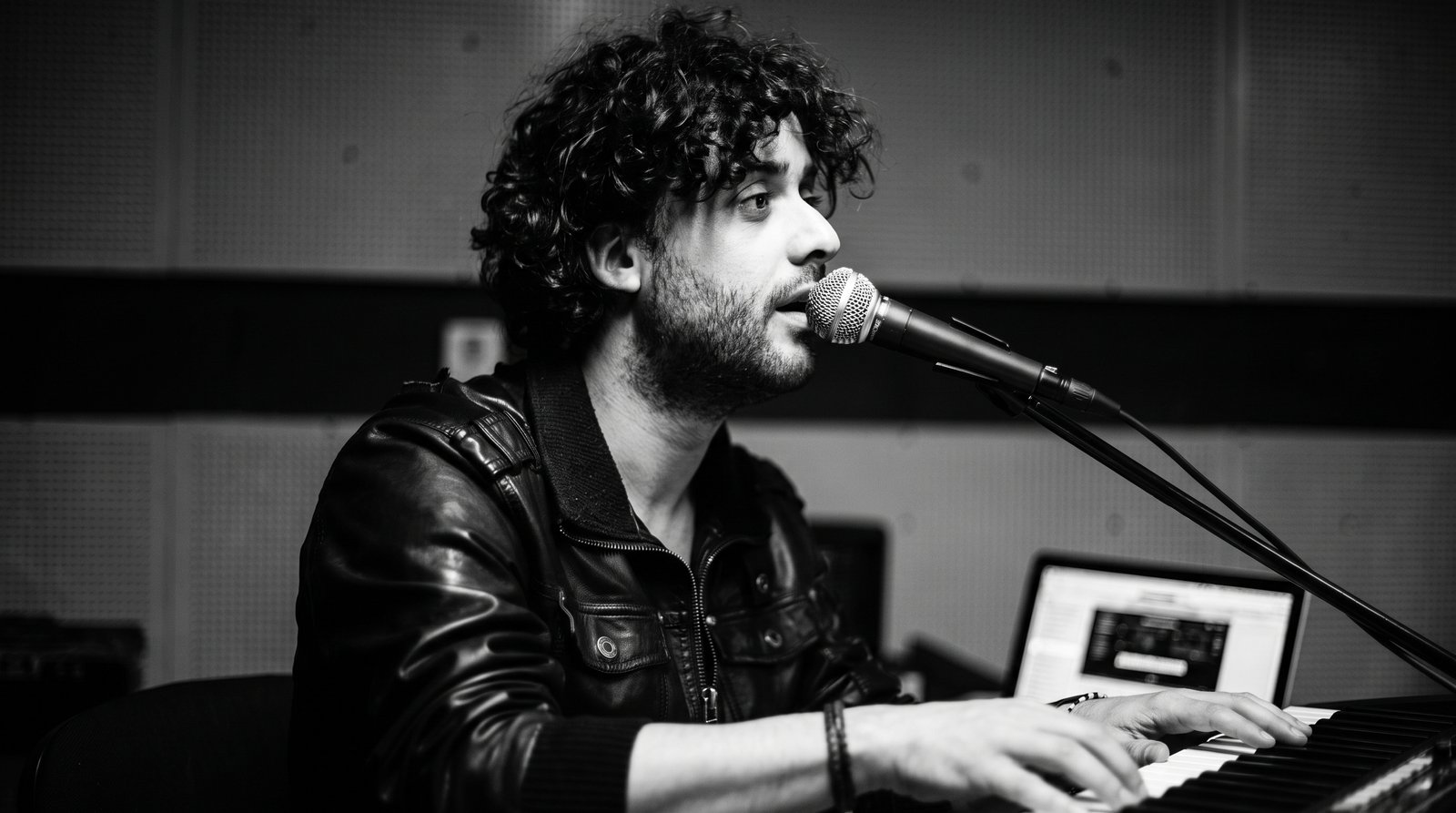 Osman Meyredi at the keys in his studio